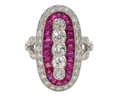 Platinum (tested) oval shaped dress ring, set with round brilliant cut diamond and calibre cut rubies and diamond set shoulde