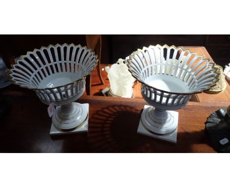 A PAIR OF 'VISTA ALEGRE PORTUGAL' PIERCED CERAMIC PEDESTAL STANDS, with gilt decoration, 26cm high
