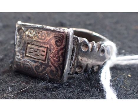 A SOLID CARNELIAN RING, possibly Islamic and a First World War 'Central Powers' Turkey, Ottoman Empire enameled ring, size G 