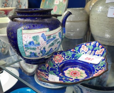 A CHINESE BLUE ENAMEL TEAPOT, 9.5cm high and similar dish