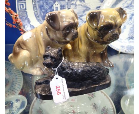 A CAST IRON STUDY OF A DOG and a pair of ceramic dogs (3)