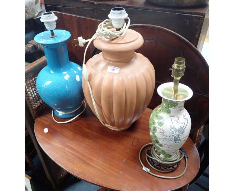 A BLUE CERAMIC TABLE LAMP, in the form of a vase and two other lamps