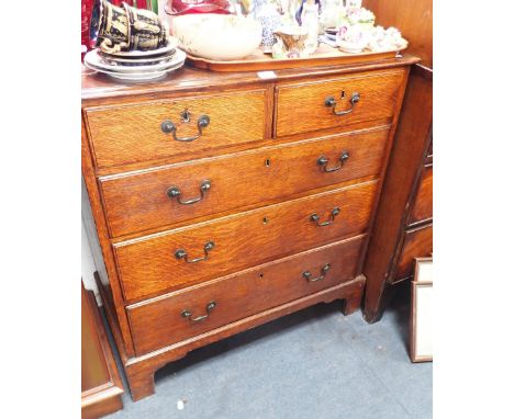 A 19TH CENTURY OAK CHEST OF DRAWERS on bracket feet, 88cm wide
