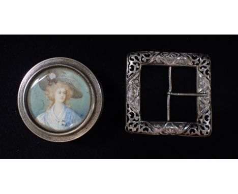 AN UNMARKED WHITE METAL CONTAINER, with engine turned decoration, the lid with a hand painted portrait of a ladies head and s