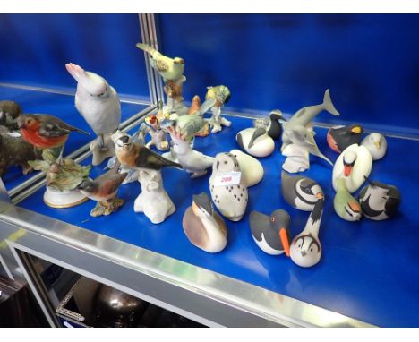 A COLLECTION OF ISLE OF ARRAN CERAMIC BIRDS and others similar