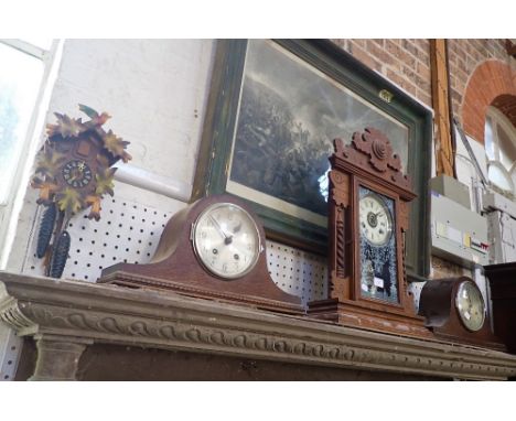 AN AMERICAN WALNUT CASED 'GINGERBREAD' SHELF CLOCK and two Napoleon Hat Clocks