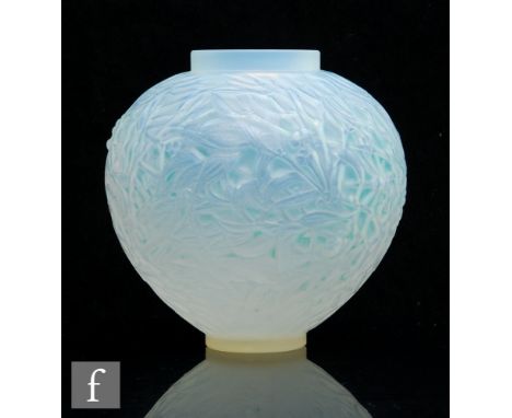 Rene Lalique - A Gui glass vase circa 1920, model 948, of footed ovoid form with shallow collar neck relief moulded with over