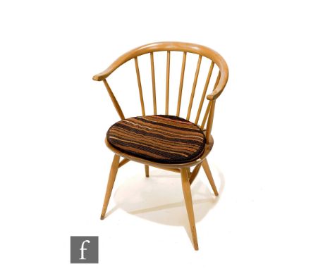 Lucian Ercolani - Ercol Furniture - A beech and elm model 449a Windsor bow top armchair or 'Cowhorn' chair, bears blue foil l