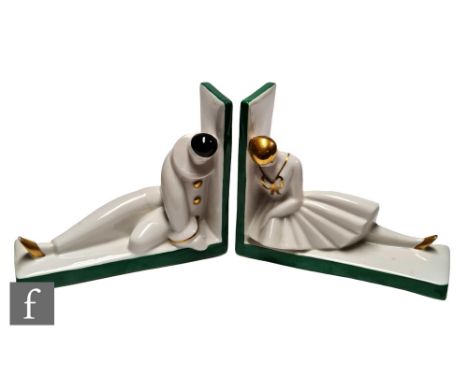 Robj - A pair of 1920s Art Deco porcelain bookends modelled as Pierrot and Pierrette, each love sick with their heads down, s