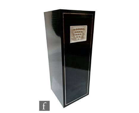 Lalique - A black lacquer pedestal display plinth, designed circa 1998, the front inset with a frosted crystal panel of Laliq