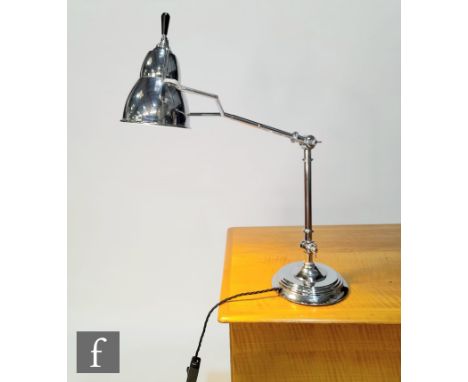 Unknown - A chrome adjustable desk lamp, the stepped circular base with tubular adjustable arms and shade, height 66cm. 