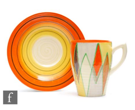 Clarice Cliff - Sungold - A Lynton shape coffee can and saucer circa 1934, hand painted with a tessellating diamond design in