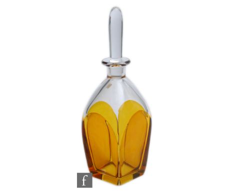 Vickie Lindstrand - Orrefors - A Swedish glass decanter, circa 1939, of ovoid form, cased in amber over clear with four polis