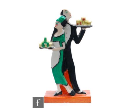 Goebel - A 1930s Art Deco cocktail stick holder modelled as a butler and a maid dressed in green serving cocktails, impressed