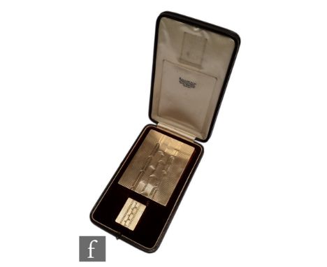 Boucheron - An Art Deco 9 carat gold rectangular cigarette case and lighter each signed Boucheron, Paris Londres and engraved