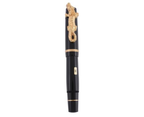  Montblanc, Year of the Golden Dragon, a limited edition fountain pen,   no. 1010/2000, issued in 2000, black resin barrel an