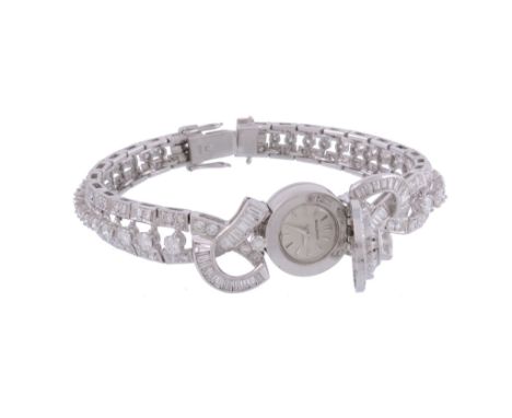  Jaeger LeCoultre, a lady's platinum and diamond bracelet  wristwatch  , back wind movement, 15 jewels, no. 1534318, silvered