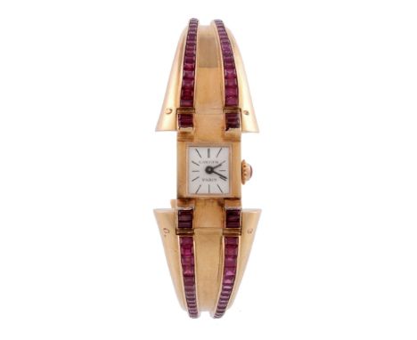  A French Retro lady's synthetic ruby bangle watch,   circa 1940, Swiss manual wind movement, 17 jewels, white dial, baton ma