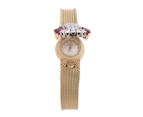  Omega, Turler, a lady's 18 carat gold, diamond and ruby bracelet watch,   back wind movement, 17 jewels, cal. 440, no. 17162