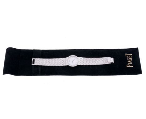 Piaget, ref. 8706 D2, a lady's 18 carat white gold and diamond bracelet wristwatch,   no. 656211, circa 1980, quartz movemen
