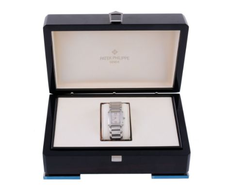  Patek Philippe, Twenty 4, ref. 4910/10A, a lady's stainless steel and diamond bracelet wristwatch,   circa 2007, quartz move