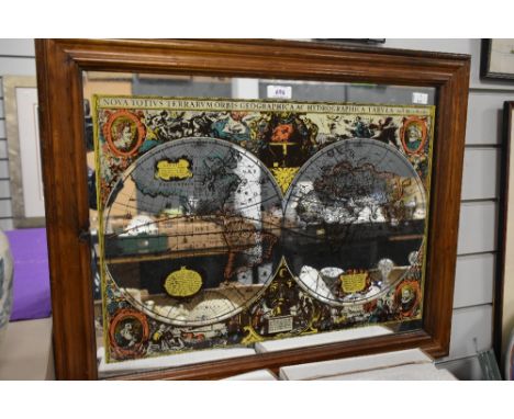 A vintage world map mirror 55cm x 63cm.