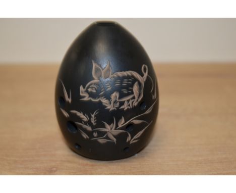 A Chinese pottery egg-shaped Xun Ocarina flute musical instrument, incised decoration of a piglet and foliage, impressed seal