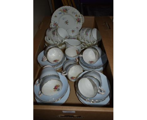 A Minton Marlow part tea service having 21 pieces sold along with a Grosvenor part tea service in blue with gilt edging and f