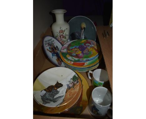A carton of assorted display plates including a selection of vintage melamine Ronald MacDonald plates and matching mug, a Coa