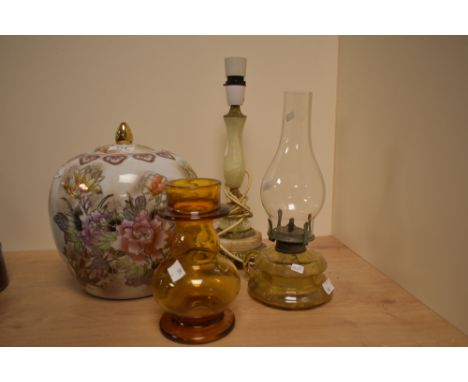 A vintage amber glass oil lamp, a similar amber glass vase, a vintage marble table lamp and a vintage Oriental style ginger j