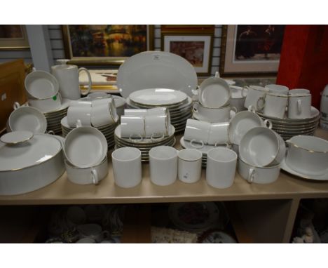 A large dinner service stamped 'Thomas Germany', white with gold colour rim, to include tea pot, cups/saucers, platter, sugar