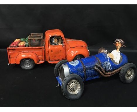 SCULPTURE OF A MAN IN A VINTAGE CAR BY GUILLERMO FORCHINO, boxed, along with another (2)