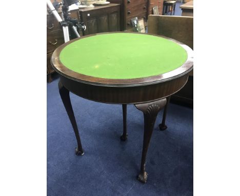 EARLY 20TH CENTURY TIP OVER CARD TABLE with ball and claw feet