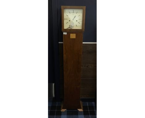 SMITH'S LONGCASE CLOCK, three front winding key holes, presentation plaque below face, of Art Deco design, 145cm high