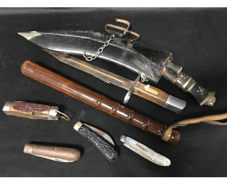 NEPALESE KUKRI CARVING SET, along with various fruit and other knives, a police baton, and a deactivated grenade