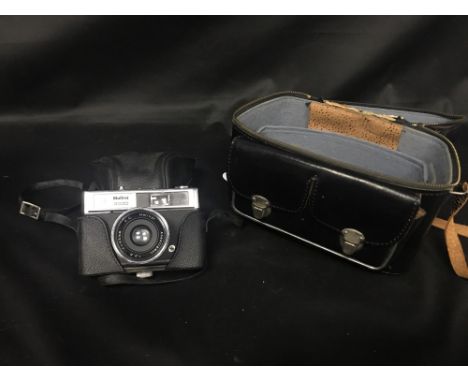 HALINA 2000 FILM CAMERA, with a carry case and blue felt lined black leather camera bag; along with a large vintage hat box, 