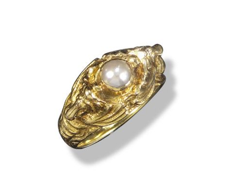 A gold ring by Omar Ramsden, centred with a half pearl within intertwined embossed seahorses, engraved to interior 14 July 19