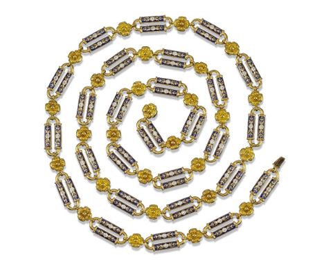 A long Swiss enamelled gold fancy link necklace, c1825, the oval-shaped links with two sections of white, blue and gold ename
