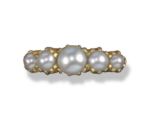 A late Victorian half-pearl mounted half hoop ring, five graduated half-pearls are set in gold, size Q, box by Didier