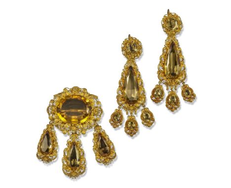 An early 19th century citrine-mounted gold cannetille girondole-style demi-parure, c.1825, the brooch centred with an oval-sh