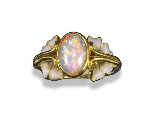 An Art Nouveau opal and enamel ring by René Lalique, c1900, the solid white opal cabochon set within yellow gold rubover sett