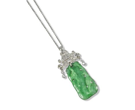 An early 20th century jade and diamond pendant, c1925, the tapered rectangular jade plaque pierced and carved with a bird and
