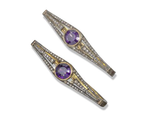 A pair of Victorian amethyst and diamond hinged bangles, each centred with a circular-cut amethyst within rows of graduated r