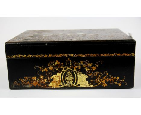 An early 19th century French wooden sewing box with gilt and mother of pearl decoration, 28.5cm x 22cm x 11cm.