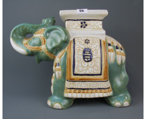 A ceramic elephant garden stool, H. 37cm.