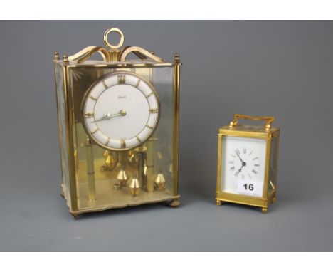 A 'De la Grense' gilt brass carriage clock, H. 12.5cm, together with a Frescott brass and glass mantel clock, 26cm. Missing o
