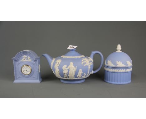 A Wedgwood teapot, and two further Wedgwood items, teapot L. 23cm.