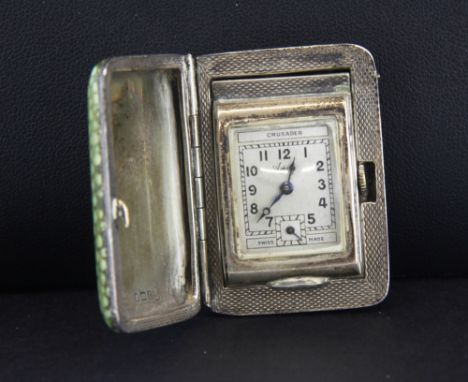 An early 20th century hallmarked silver and shagreen travel clock, Birmingham circa 1935, with slide action closure. 4.5 x 3 