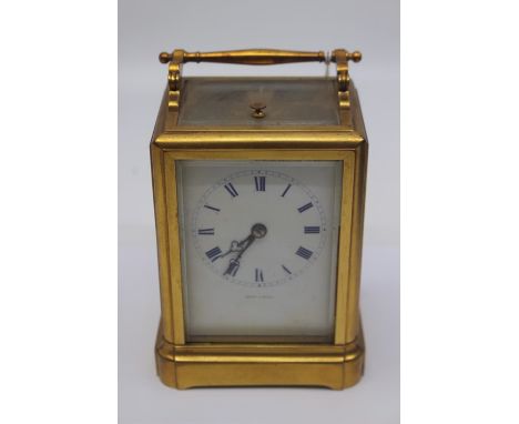 A Dent A Paris brass carriage clock, probably late 19th Century, repeater button, white dial with Roman numerals, 13cm high, 