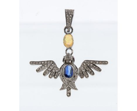 A blue sapphire and opal diamond set silver pendant in the form of a bird, the body set to the centre with an oval sapphire, 